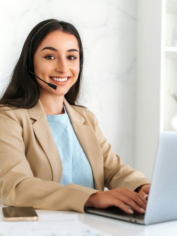 Call center, customer support service. Confident positive woman, call center operator with headset