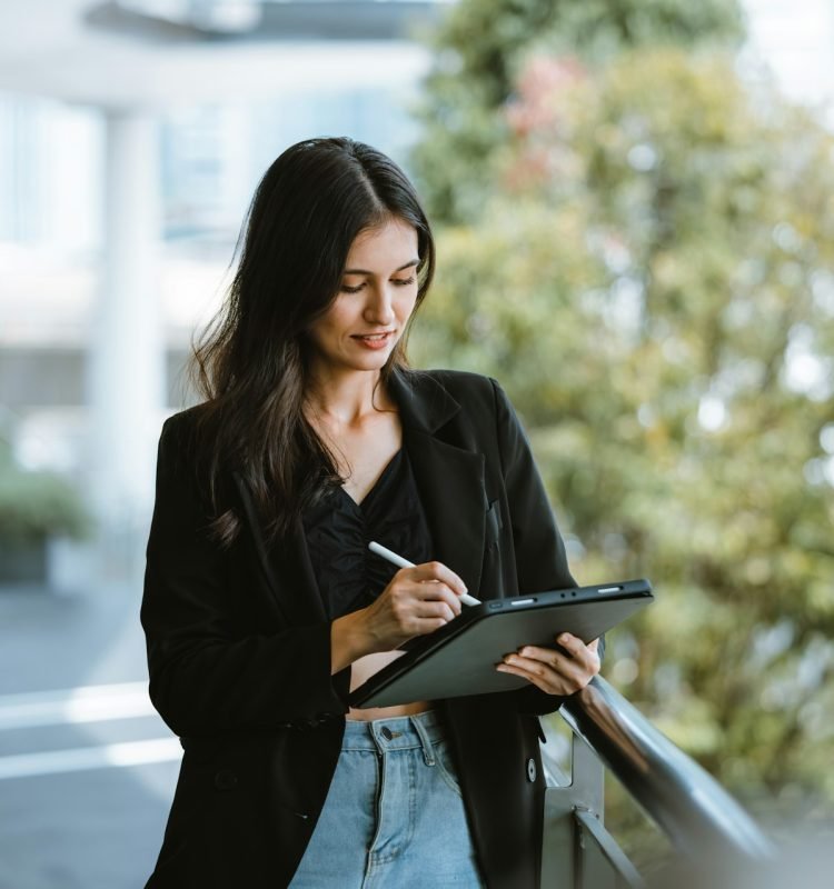 Millennial digital nomads work remotely, using laptops to connect , create content on the move.